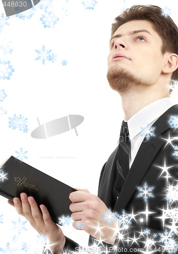 Image of man with holy bible