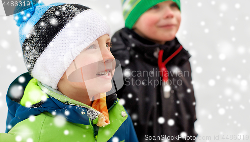 Image of close up of little boys in winter clothes outdoors