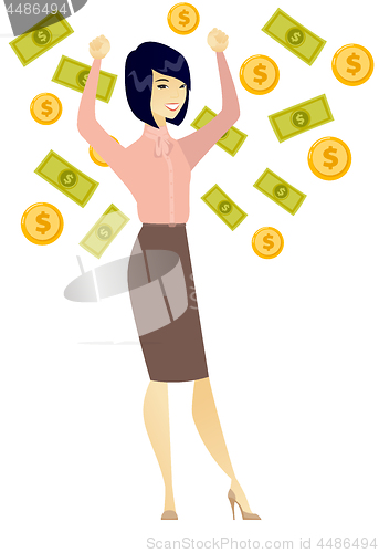 Image of Happy busiess woman under money rain.