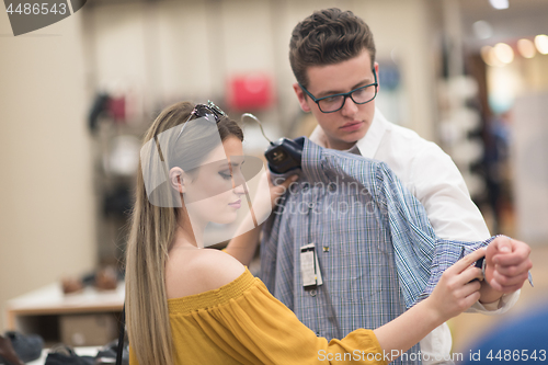 Image of couple in  Clothing Store