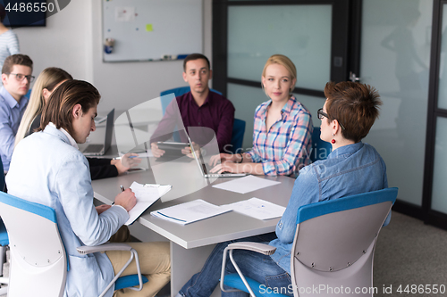 Image of Business Team At A Meeting at modern office building