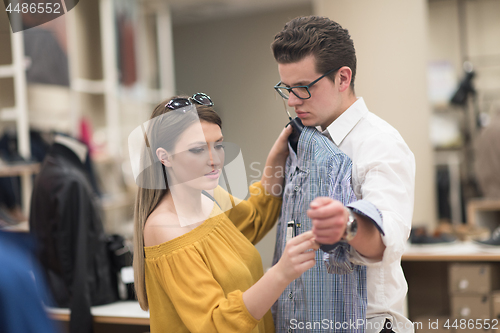 Image of couple in  Clothing Store