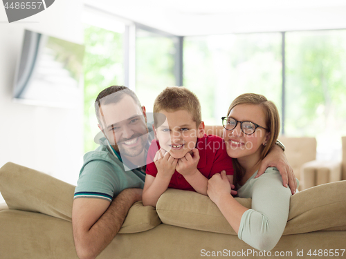 Image of family with little boy enjoys in the modern living room