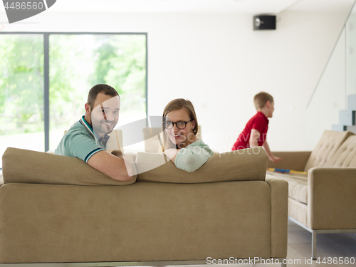 Image of family with little boy enjoys in the modern living room