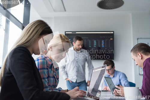 Image of Group of young people meeting in startup office