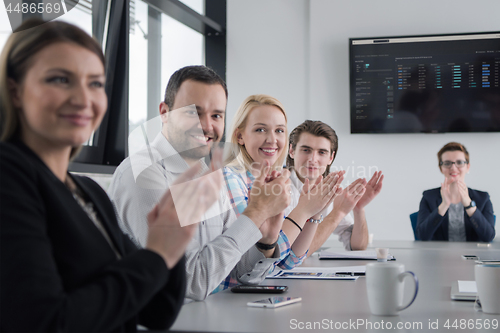 Image of Group of young people meeting in startup office