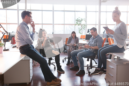 Image of Young Business Team At A Meeting at modern office building