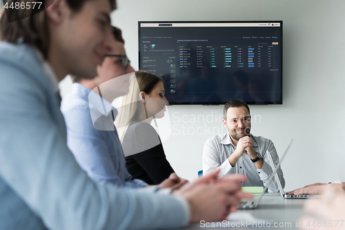 Image of Business Team At A Meeting at modern office building