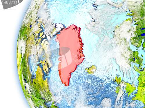 Image of Greenland on model of Earth