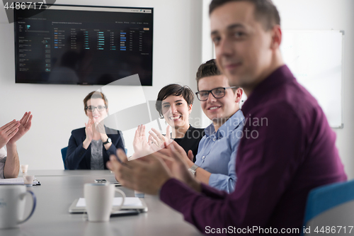 Image of Group of young people meeting in startup office