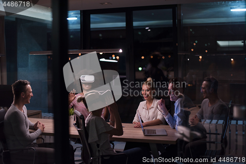 Image of Multiethnic Business team using virtual reality headset