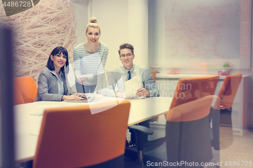 Image of Business Team At A Meeting at modern office building