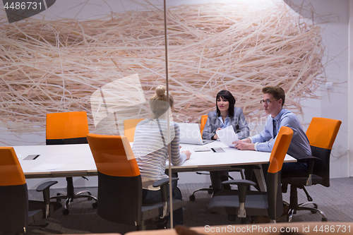 Image of Business Team At A Meeting at modern office building