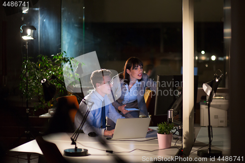 Image of young designers in the night office