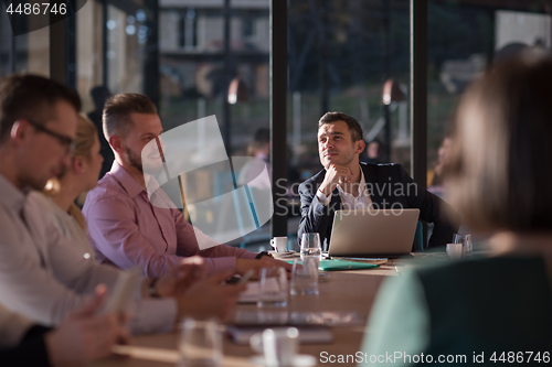 Image of Business Team At A Meeting at modern office building