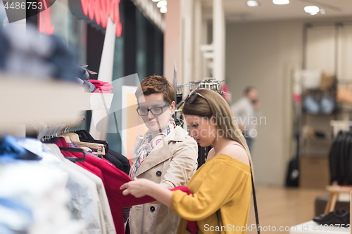 Image of best friend shopping in big mall