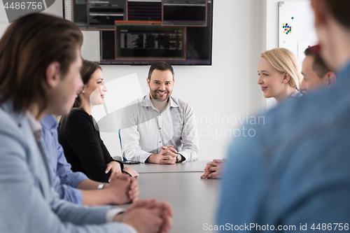 Image of Business Team At A Meeting at modern office building