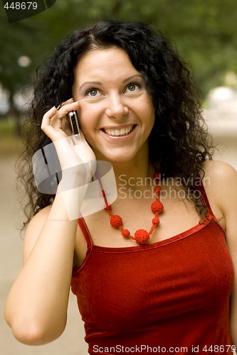 Image of pretty woman using mobile phone