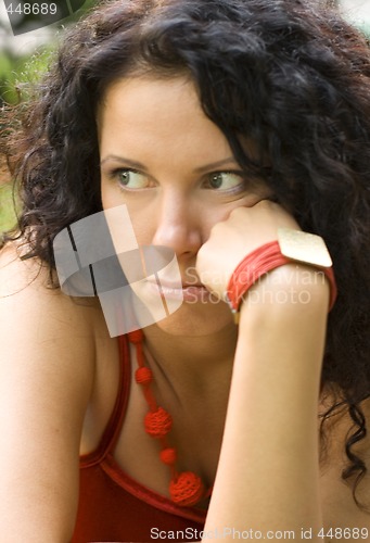 Image of unhappy attractive brunet woman