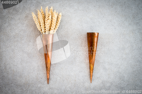 Image of Two vintage copper cones with wheat ears