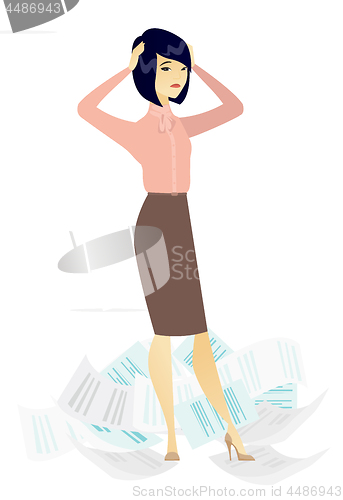 Image of Stressed business woman having lots of work to do.