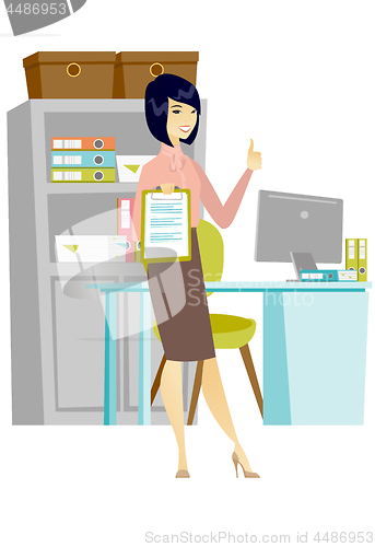 Image of Business woman with clipboard giving thumb up.