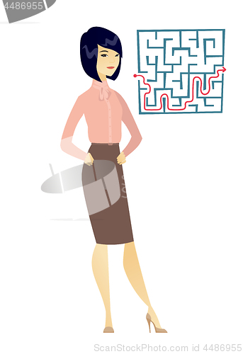 Image of Business woman looking at labyrinth with solution