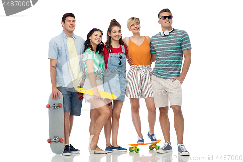 Image of friends with skateboards over white background