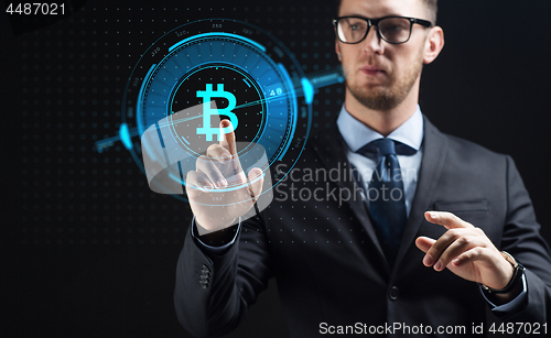 Image of close up of businessman with bitcoin hologram