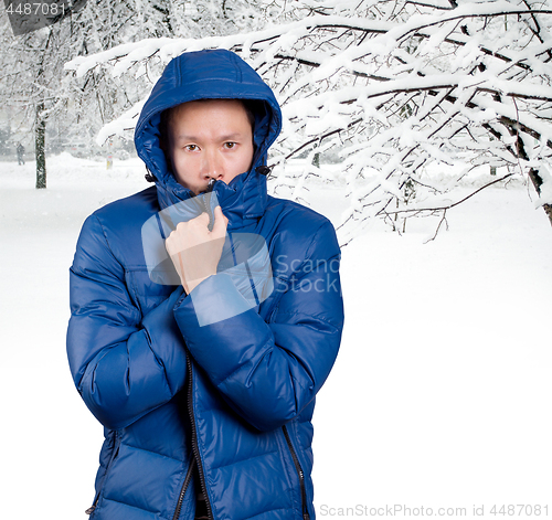 Image of Sad Asian man in Blue