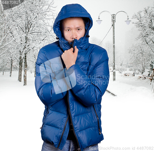 Image of Sad Asian man in Blue