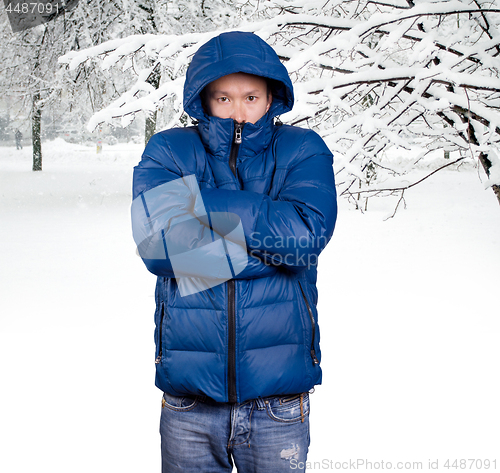 Image of Sad Asian man in Blue