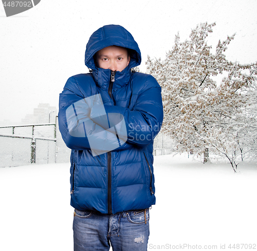 Image of Sad Asian man in Blue