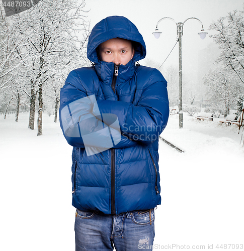 Image of Sad Asian man in Blue