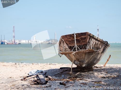 Image of Old, abandoned fishing boat on the beach