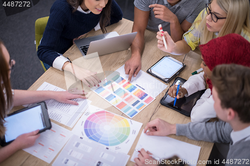 Image of Multiethnic startup business team having meeting