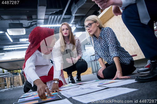 Image of black muslim woman having meeting with Multiethnic  startup busi