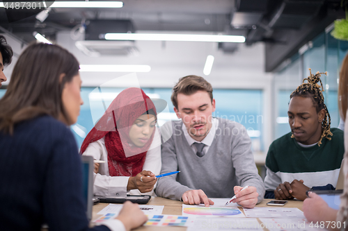 Image of Multiethnic startup business team having meeting