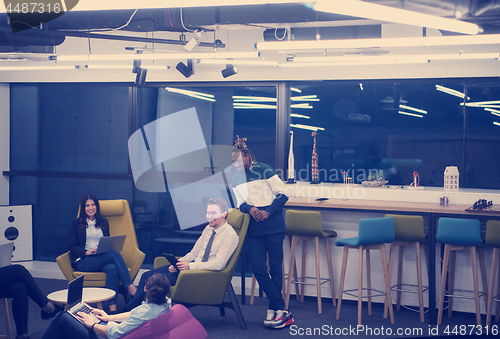 Image of Multiethnic startup business team having meeting