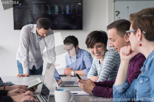 Image of Group of young people meeting in startup office