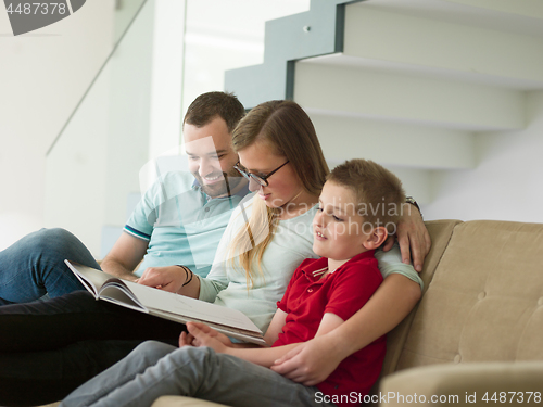 Image of family with little boy enjoys in the modern living room