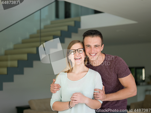 Image of couple hugging in their new home