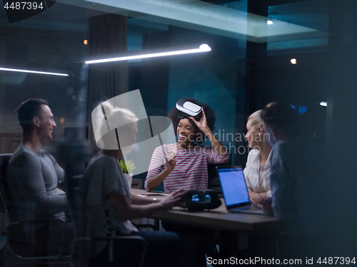 Image of Multiethnic Business team using virtual reality headset