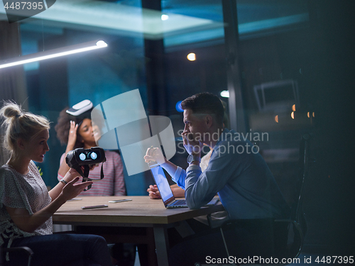 Image of Multiethnic Business team using virtual reality headset