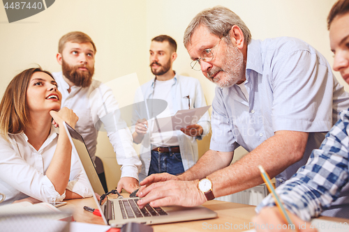 Image of Team job. Photo young businessmans working with new project in office