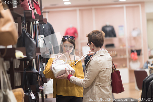 Image of best friend shopping in big mall