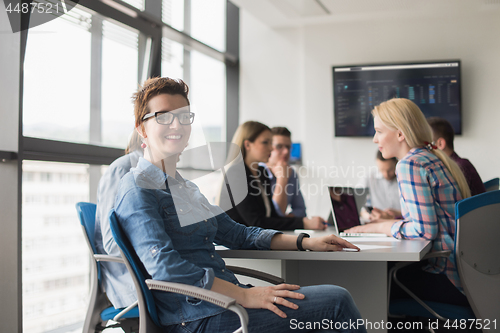 Image of Business Team At A Meeting at modern office building