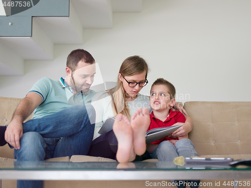 Image of family with little boy enjoys in the modern living room