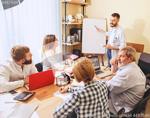 Image of Team job. Photo young businessmans working with new project in office