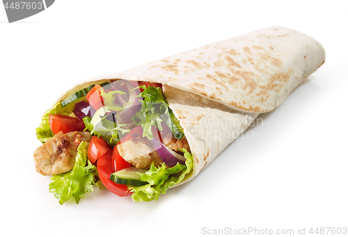 Image of Tortilla wrap with fried chicken meat and vegetables